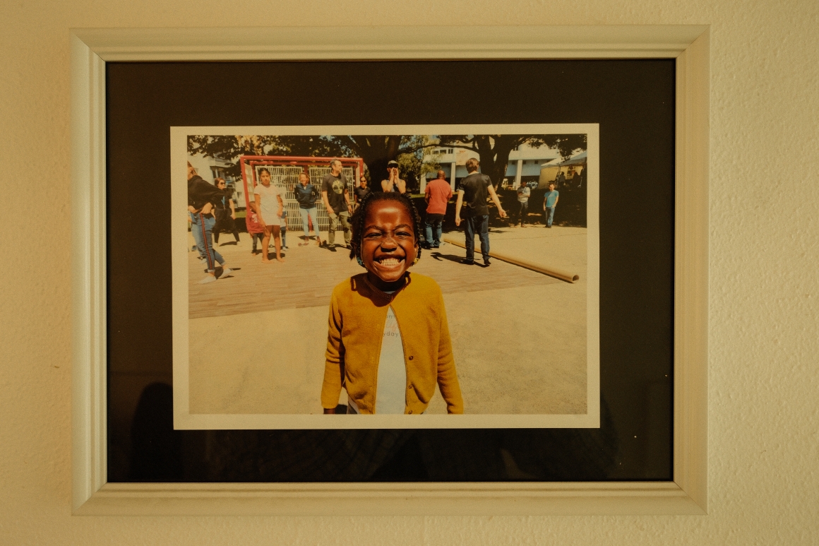 A framed photograph displayed inside Centre Social Keryado